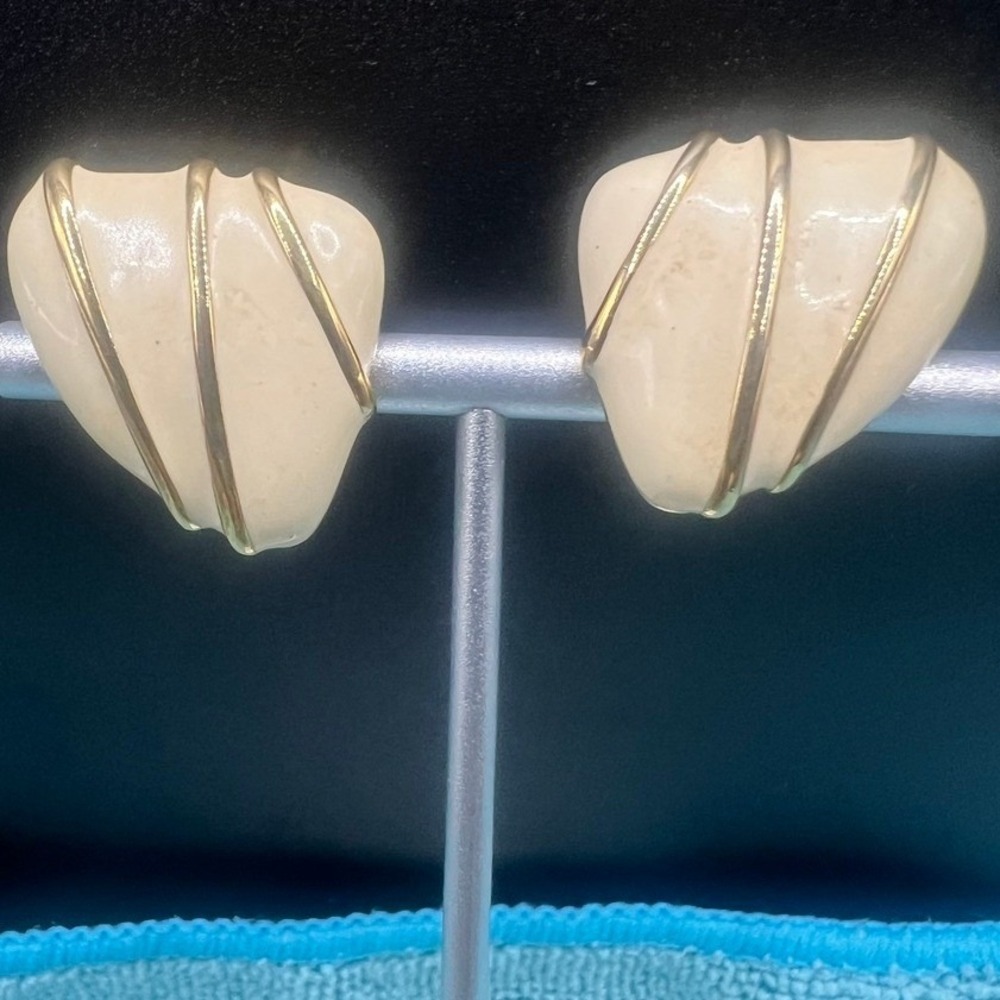 Vintage Monet Clip on‎ Earrings Enamel Wrapped Cream Gold Modern 1"